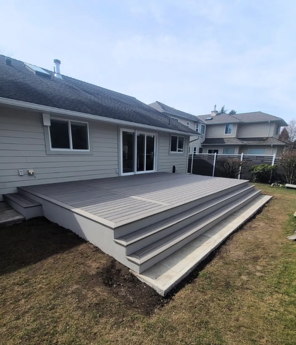 Composite deck with full-width steps